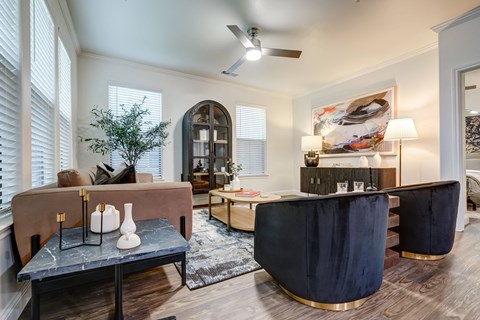 a living room with a couch and a table